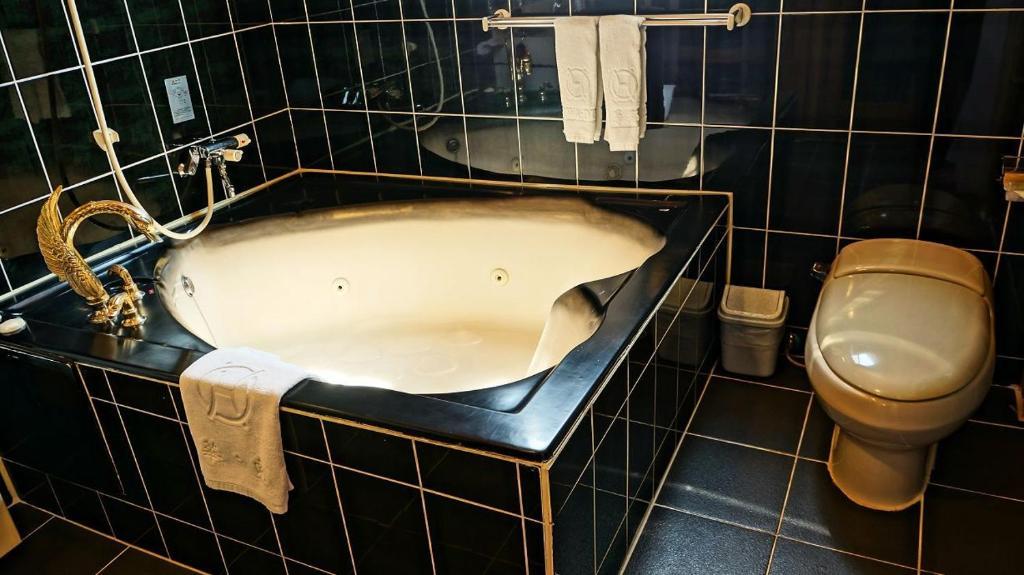 Hwa Du Hotel Tainan Rom bilde
